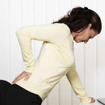 pain in the lower back in a woman